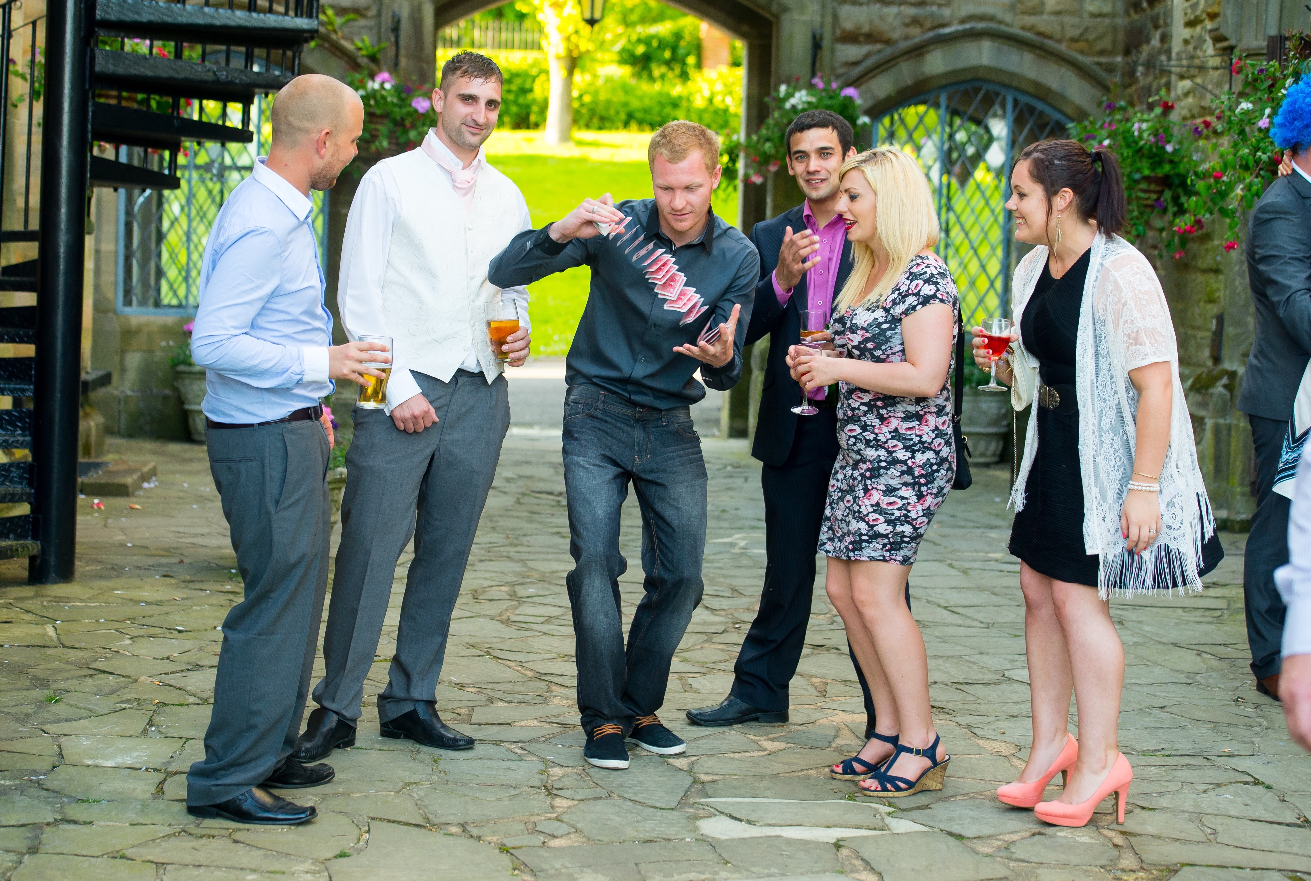 Street Magician Liam Walsh performing close up magic at Private Wedding in East Grinstead